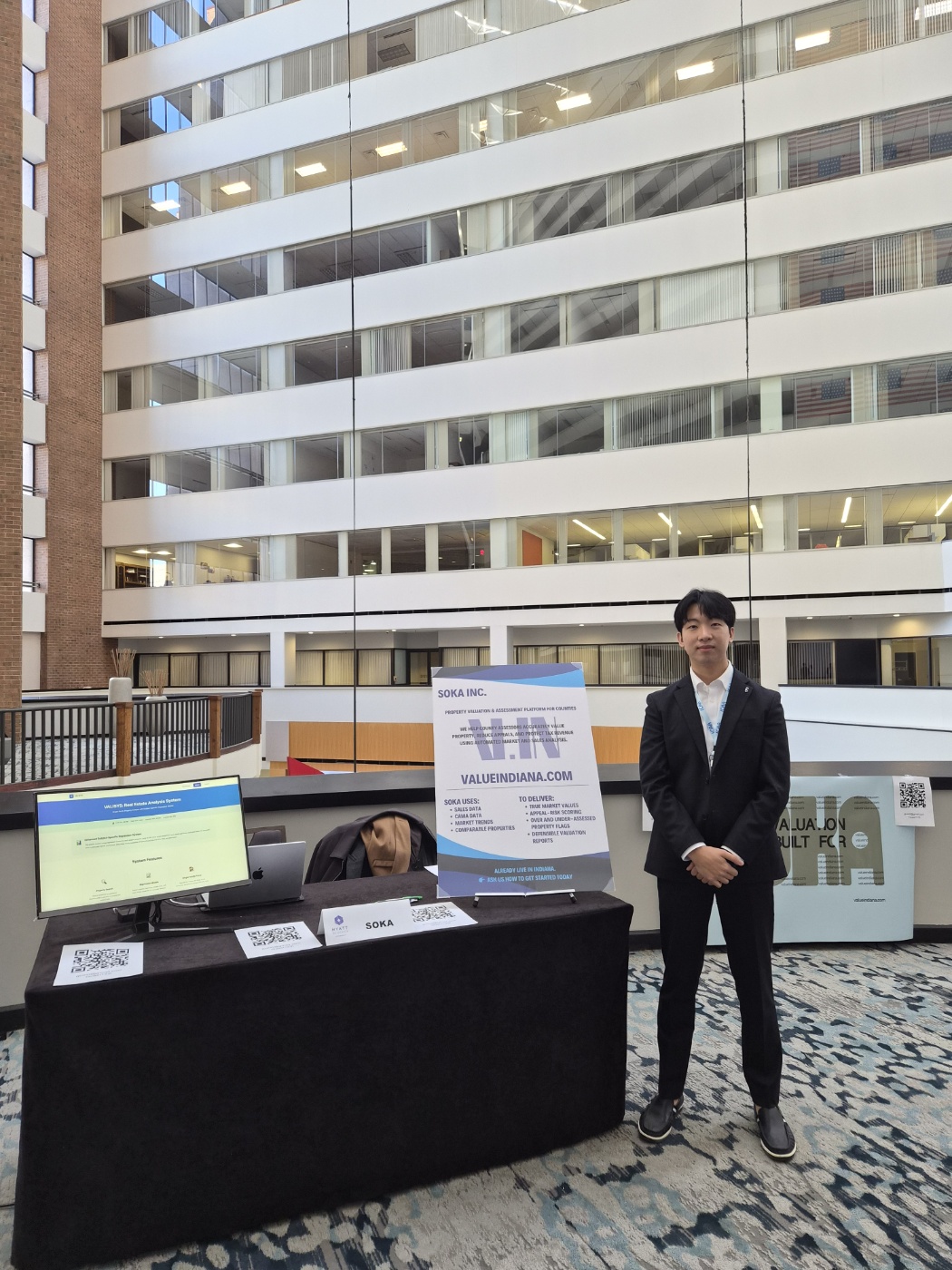 Peter beside the Value Indiana display at ICAA